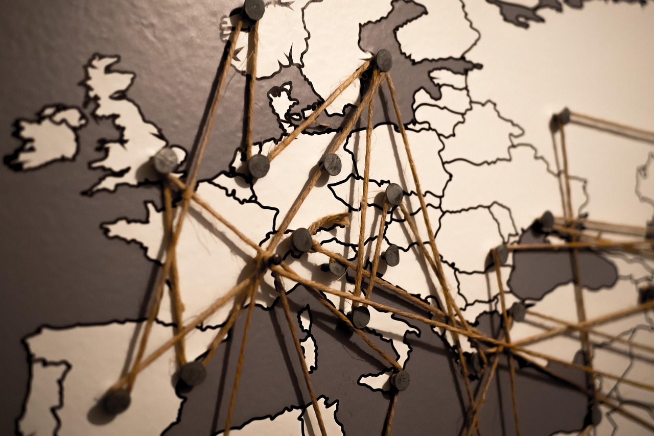 A world map with connection lines — a CDN places copies of your site on servers around the globe, close to your visitors.